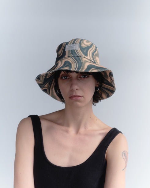 DISTORTED GREEN BUCKET HAT